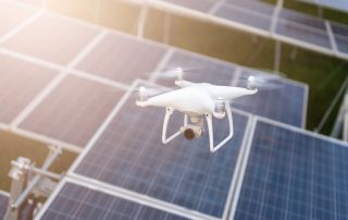 Drones flying over solar cells