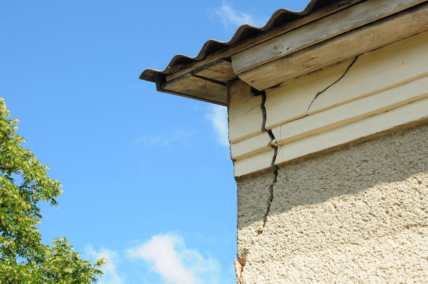Architecture detail of damaged house corner dilapidated old buil